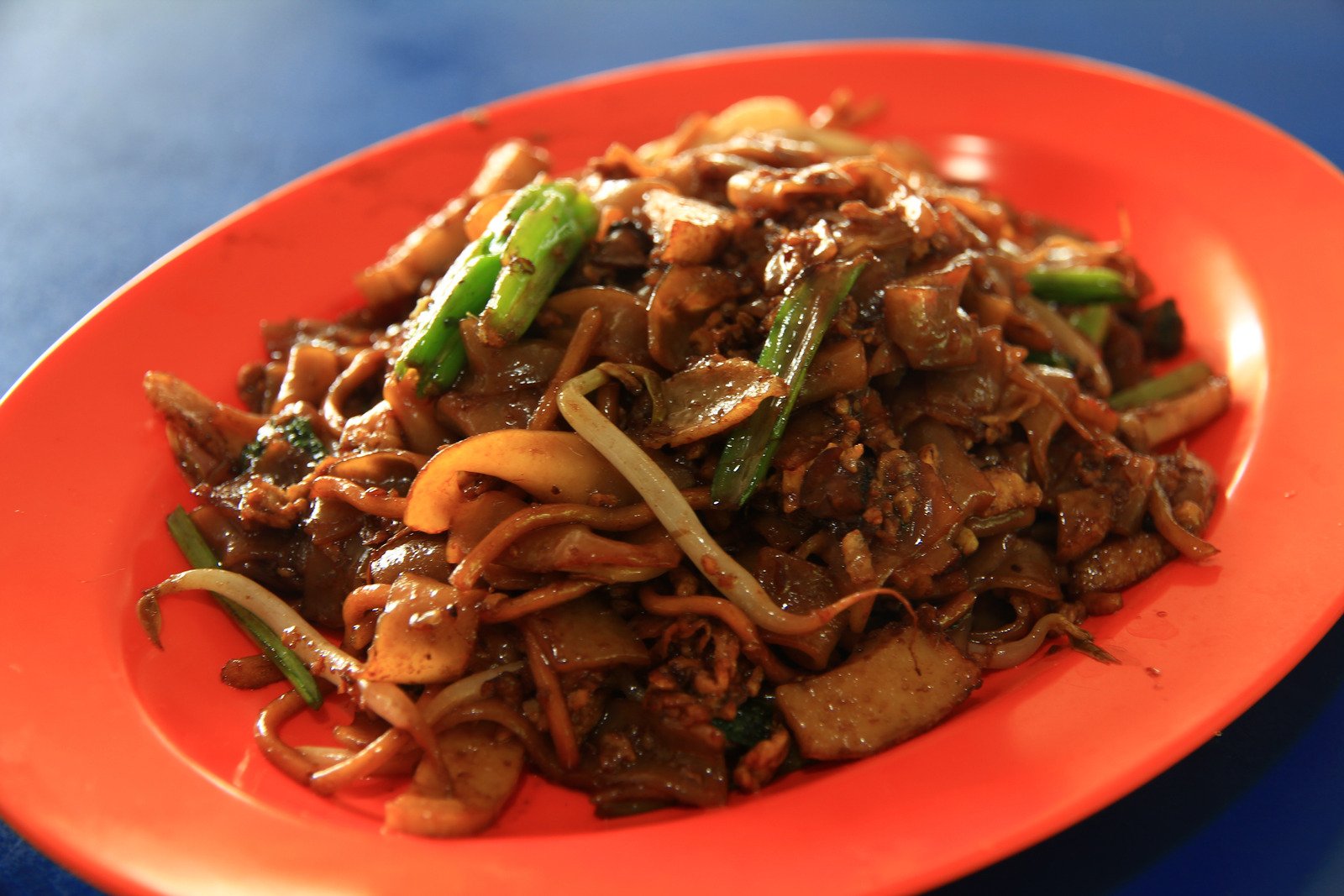 Char kway teow làm món ăn phải thử khi đến Penang
